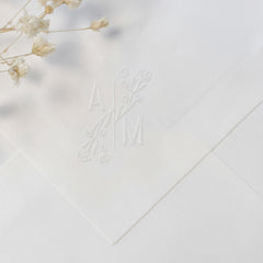 Dry stamp with floral initials