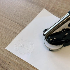 Minimalist round address embosser