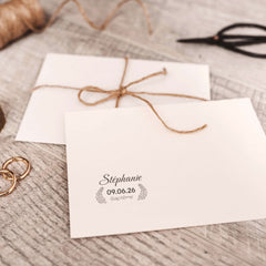 Baptism stamp with decorative leaf branch