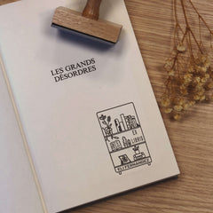 Ex-libris stamp, well-stocked shelf