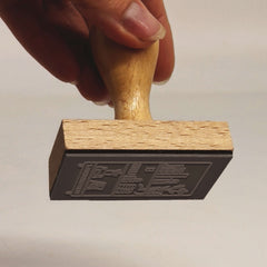 Ex-libris stamp, well-stocked shelf