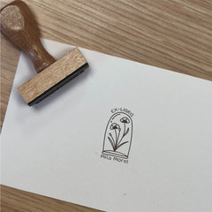 Ex-libris stamp with flowers under glass