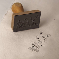 Ex-libris stamp with rose petals