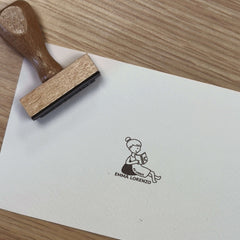 Ex-libris stamp for a reader on a pouf