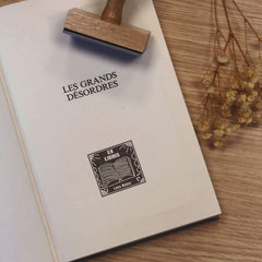 Ex-libris stamp, white book on black