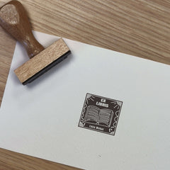 Ex-libris stamp, white book on black
